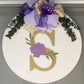 Custom Door Hanger with Family Initial, Wooden Floral Accent, Matching Bow and Eucalyptus Greenery Makes Great Housewarming or Holiday Gift